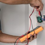 Electrician,Is,Using,A,Digital,Meter,To,Measure,The,Voltage